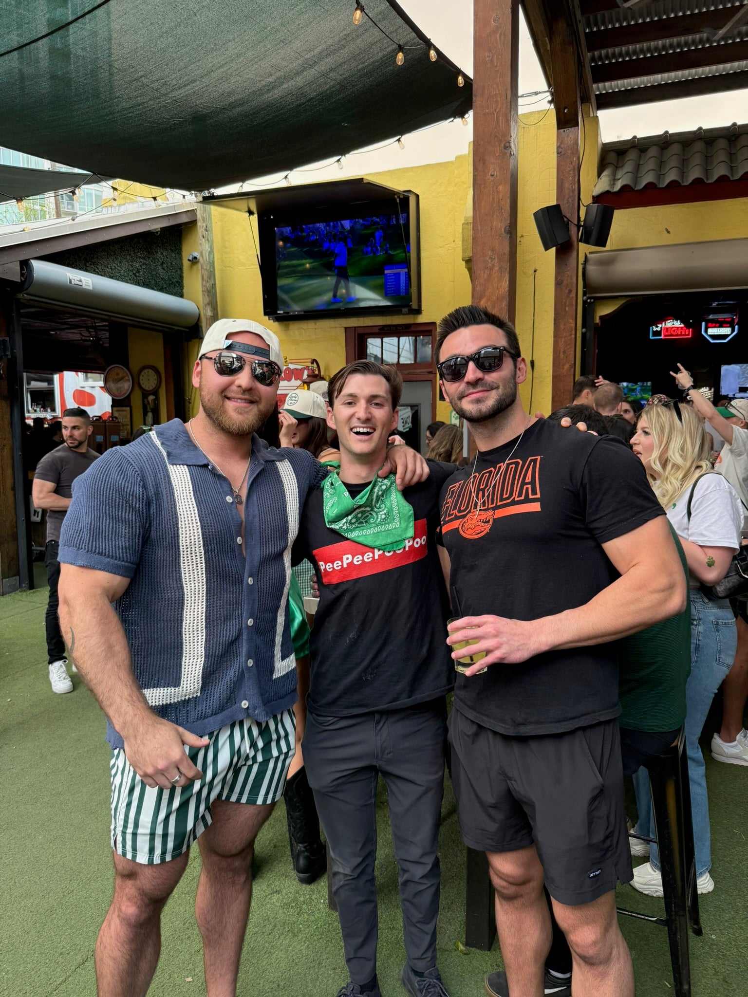 3 Friends at the bar hanging out wearing JETTIES PLUNGE SHORT & RELAX SHORTS