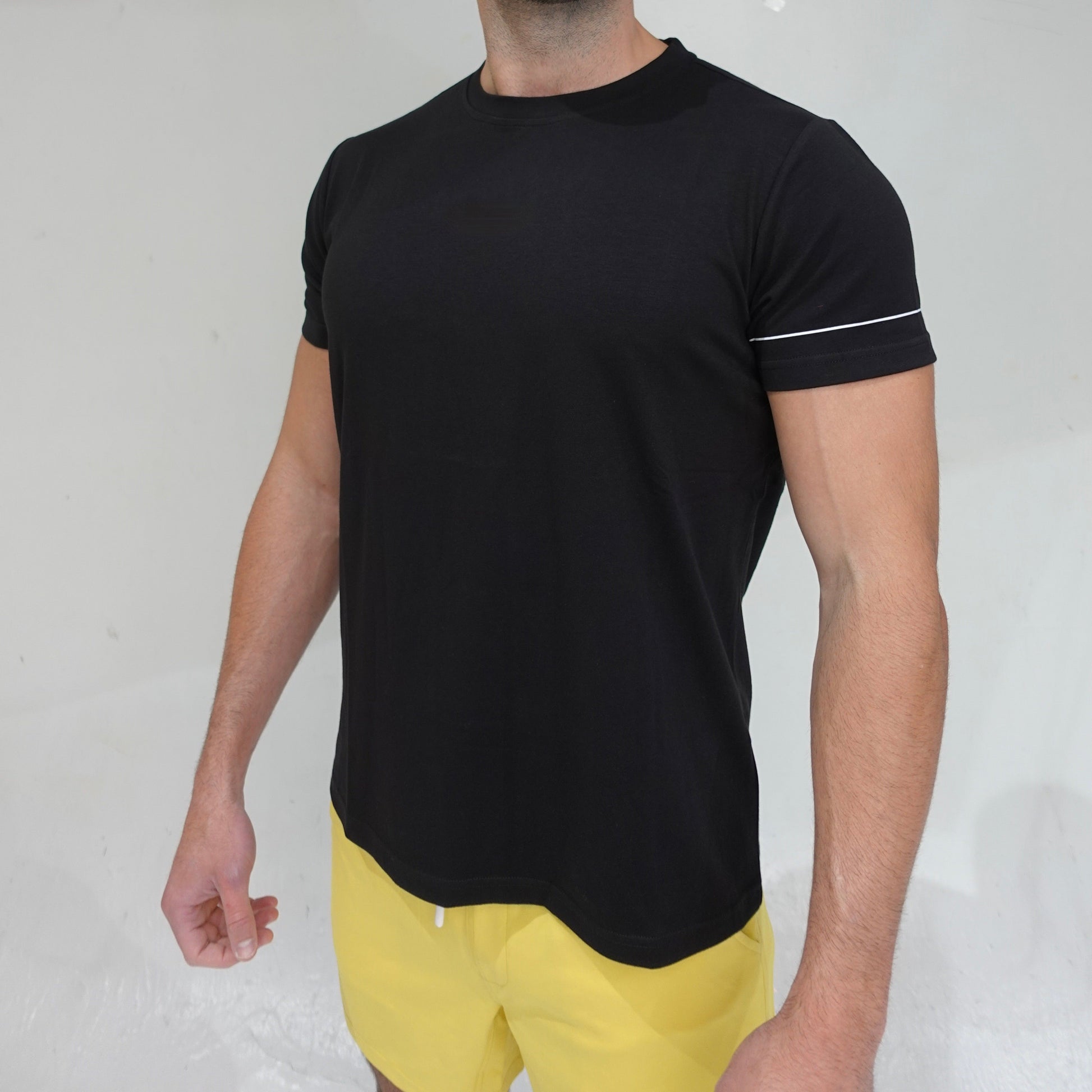 All Day Root Tee in black, short-sleeve casual t-shirt, side view, JETTIES